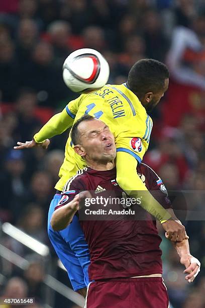 Seregei Ignashevich of Russia vies with Isaac Kiese Thelin of Sweden during the UEFA Euro 2016 qualifying round Group G football match at Otkritie...