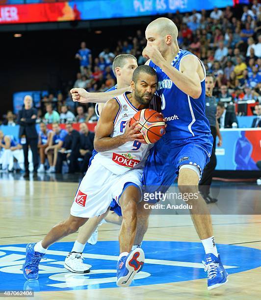 Tony Parker of France in action against Tuukka Kotti of Finland during the EuroBasket 2015 group A match between France and Finland at the Park and...