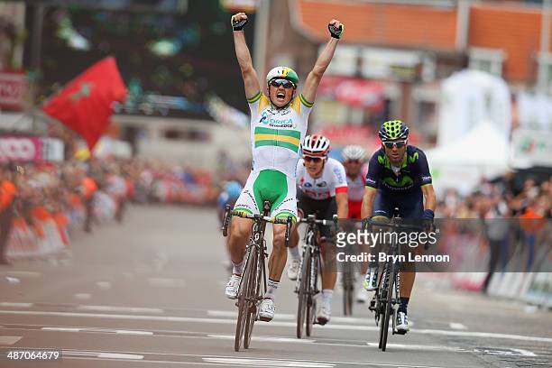 Simon Gerrans of Australia and Orica GreenEDGE celebrates after he crosses the finish line to win the 100th edition of the Liege-Bastogne-Liege road...