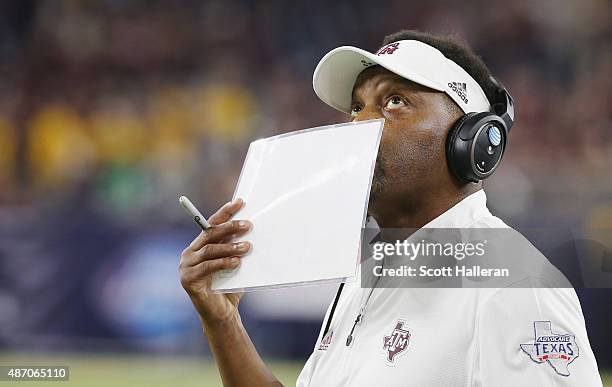 Texas A&M Aggies head coach Kevin Sumlin waits near the sidelne in the second half of their game against the Arizona State Sun Devils during the...