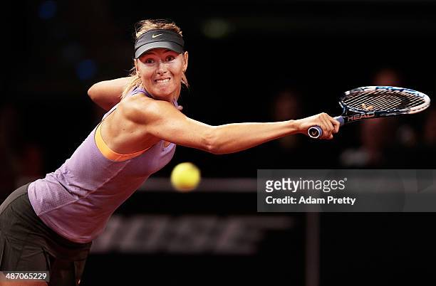 Backhand during the final against Ana Ivanovic of Serbia on day seven of the Porsche Tennis Grand Prix 2014 at Porsche-Arena on April 27, 2014 in...
