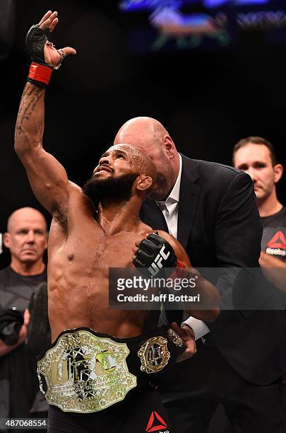Demetrious Johnson reacts to his victory over John Dodson in their flyweight championship bout during the UFC 191 event inside MGM Grand Garden Arena...