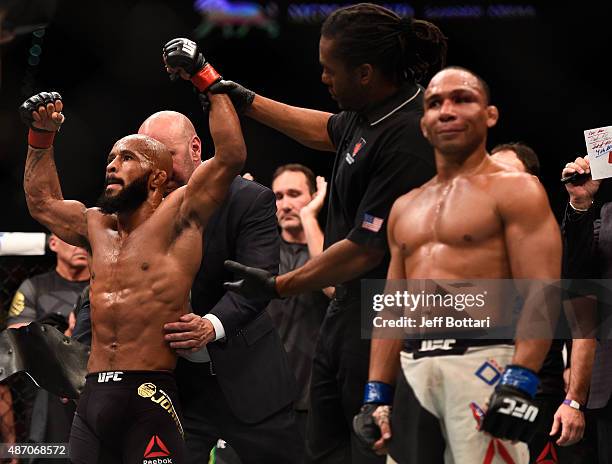 Demetrious Johnson reacts to his victory over John Dodson in their flyweight championship bout during the UFC 191 event inside MGM Grand Garden Arena...