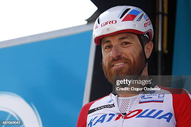 Luca Paolini of Italy and team Katusha signs in during the signature ceremony before the start of the 1st stage of the Presidencial Cycling Tour of...