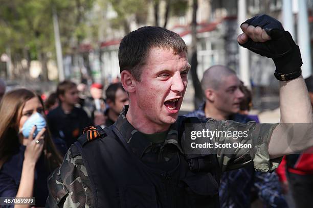 Pro-Russian activists stage a protest march on April 27, 2014 in Donetsk, Ukraine. A group of about 500 activists left a rally and marched to the TRK...