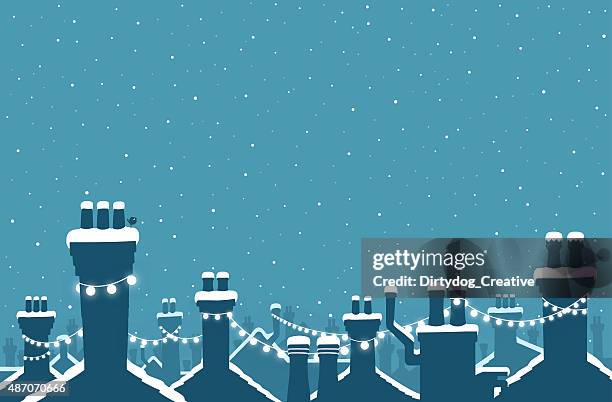 christmas snow covered chimneys strung with lights - roof stock illustrations