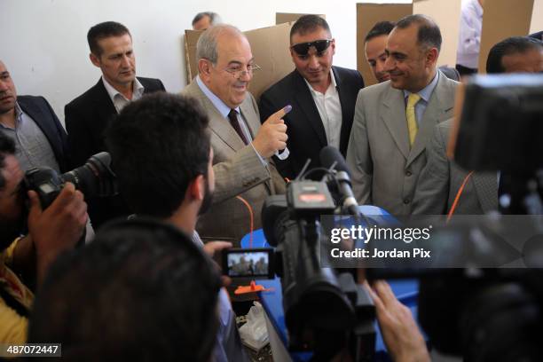 Iraqi politician Ayad Allawi votes in the Iraqi parliamentary elections at a polling station April 27, 2014 in Amman, Jordan. Iraq's former prime...