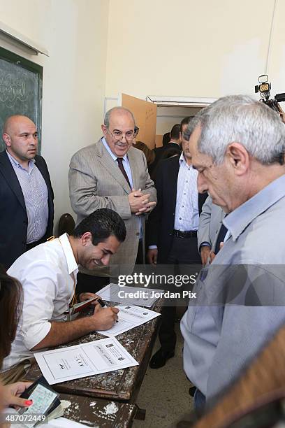 Iraqi politician Ayad Allawi votes in the Iraqi parliamentary elections at a polling station April 27, 2014 in Amman, Jordan. Iraq's former prime...