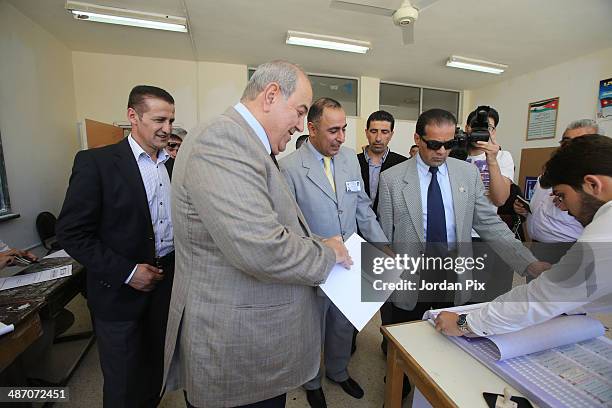 Iraqi politician Ayad Allawi votes in the Iraqi parliamentary elections at a polling station April 27, 2014 in Amman, Jordan. Iraq's former prime...