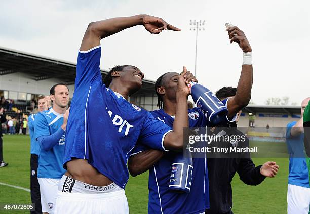 Armand Gnanduillet and Nathan Smith of Chesterfield poses for a selfie photo as they celebrate their promotion during the Sky Bet League Two match...