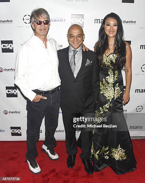 Actor Eric Roberts, recording artists Omar Akram and Avasant vice president for marketing Jemie Sae Koo pose for portrait at 5th Annual JSK birthday...