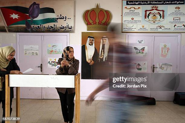 Iraqis wait to vote in the Iraqi parliamentary elections at a polling station April 27, 2014 in Amman, Jordan. Iraq's former prime minister Ayad...