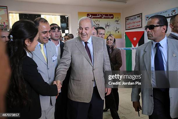 Iraqi politician Ayad Allawi arrives to vote in the Iraqi parliamentary elections at a polling station April 27, 2014 in Amman, Jordan. Iraq's former...