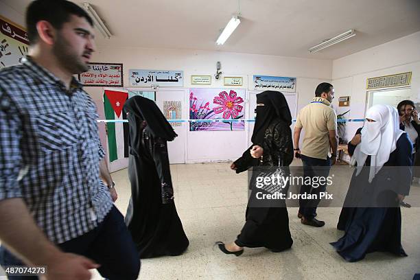 Iraqis wait to vote in the Iraqi parliamentary elections at a polling station April 27, 2014 in Amman, Jordan. Iraq's former prime minister Ayad...