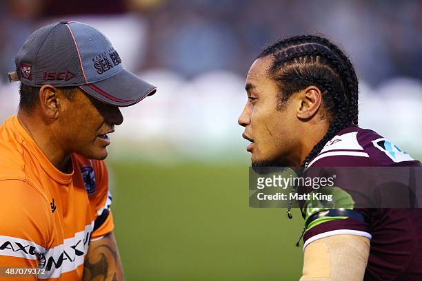 Steve Matai of the Sea Eagles is checked by a trainer during the round 26 NRL match between the Cronulla Sharks and the Manly Sea Eagles at Remondis...