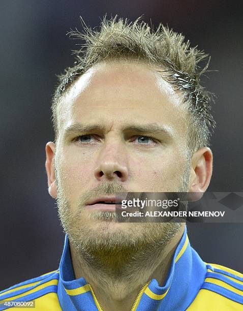 Sweden's defender Andreas Granqvist listens to the national anthem before an UEFA Euro-2016 qualifying round Group G football match between Russia...
