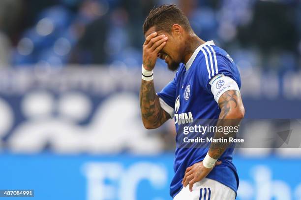 Kevin Boateng of Schalke looks dejected after the Bundesliga match between FC Schalke 04 and Borussia Moenchengladbach at Veltins-Arena on April 27,...