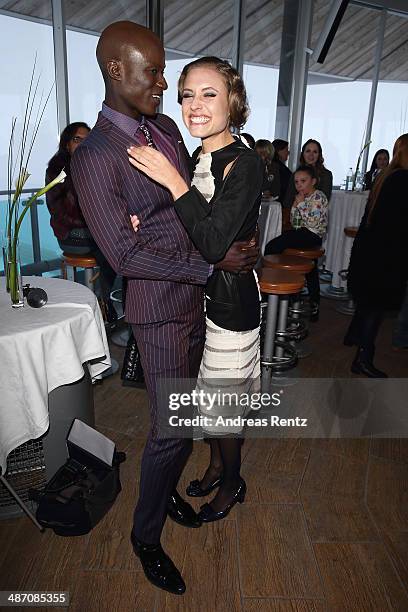 Alena Gerber and Papis Loveday attend the Rebekka Ruetz Fashion Show at Top Mountain Star on April 26, 2014 at Hochgurgl near Solden, Austria.