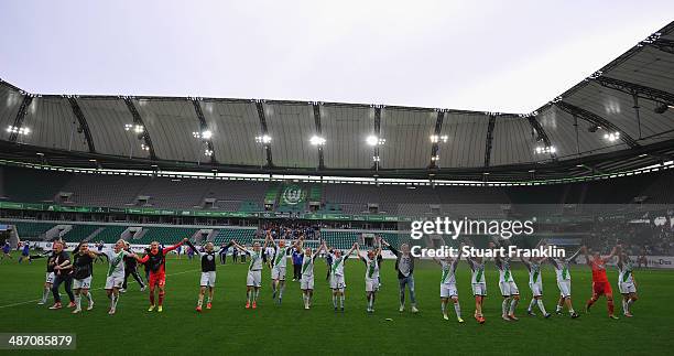 The players of Wolfsburg celebrate their win at the end of the UEFA Women's Champions League semi final second leg match between VfL Wolfsburg and 1....