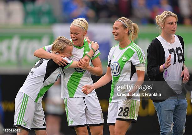 The players of Wolfsburg celebrate their win at the end of the UEFA Women's Champions League semi final second leg match between VfL Wolfsburg and 1....