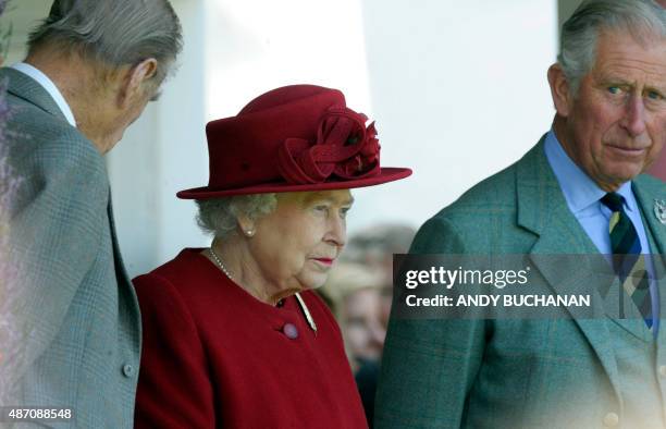 Britain's Queen Elizabeth II , Britain's Prince Philip, Duke of Edinburgh and Britain's Prince Charles, Prince of Wales attend the annual Braemar...