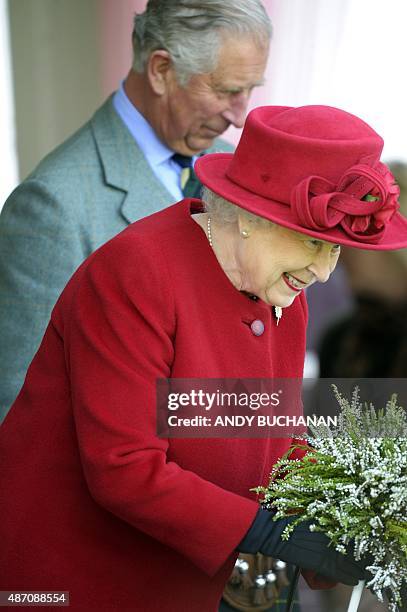 Britain's Queen Elizabeth II attends the annual Braemar Gathering in Braemar, central Scotland, on September 5, 2015. The Braemar Gathering is a...