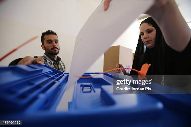 Person votes in the Iraqi parliamentary elections at a polling station April 27, 2014 in Amman, Jordan. Iraq's former prime minister Ayad Allawi on...