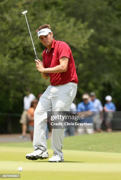 Jeff Overton putts on the 1st during the Final Round of the Zurich Classic of New Orleans at TPC Louisiana on April 27, 2014 in Avondale, Louisiana.