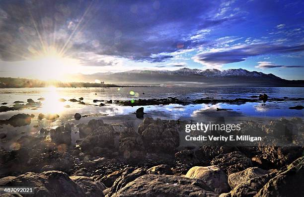 sunset over kaikoura in new zealand - marlborough stock pictures, royalty-free photos & images