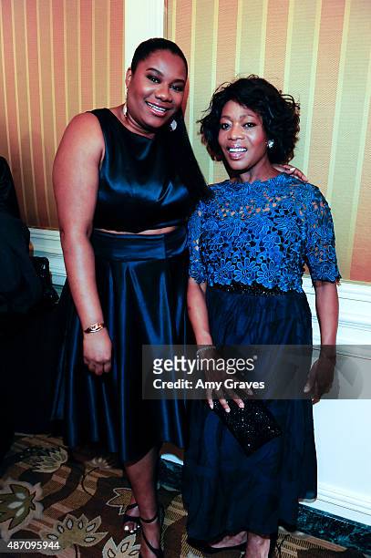 Adrienne C. Moore and Alfre Woodard attend the 8th Annual ESSENCE Black Women in Hollywood Luncheon on February 19, 2015 in Beverly Hills, California.