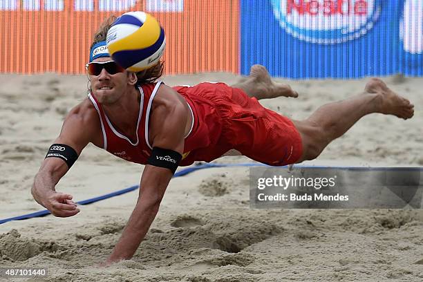 Aleksandrs Samoilovs at Latvia in action during the final match against Markus Bockermann and Lars Fluggen of Germany at the FIVB Beach Volleyball...