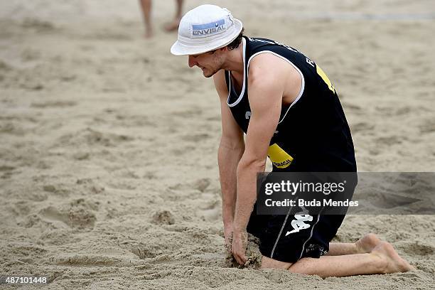 Lars Fluggen of Germany laments lost a point during final match against Janis Smedins and Aleksandrs Samoilovs at Latvia at the FIVB Beach Volleyball...