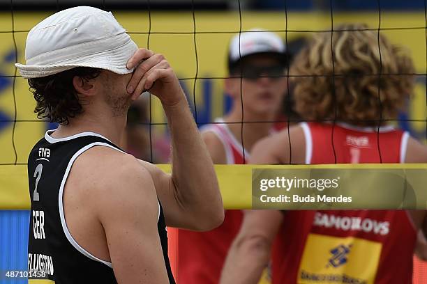 Lars Fluggen of Germany laments lost a point during final match against Janis Smedins and Aleksandrs Samoilovs at Latvia at the FIVB Beach Volleyball...