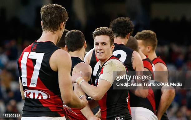 Orazio Fantasia of the Bombers celebrates after the 2015 AFL round 23 match between the Collingwood Magpies and the Essendon Bombers at the Melbourne...