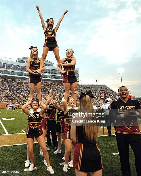 Cheerleaders of the Elon Phoenix perform during their game against the Wake Forest Demon Deacons at BB&T Field on September 3, 2015 in Winston-Salem,...