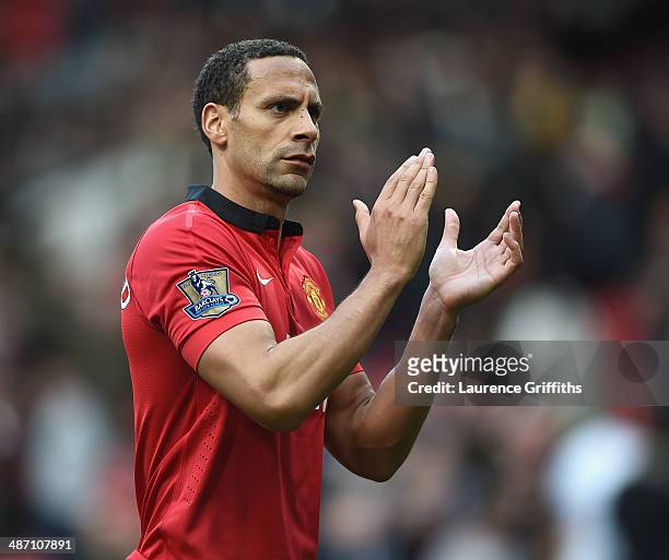 Rio Ferdinand of Manchester United applauds the fans after the Barclays Premier League match between Manchester United and Norwich City at Old...