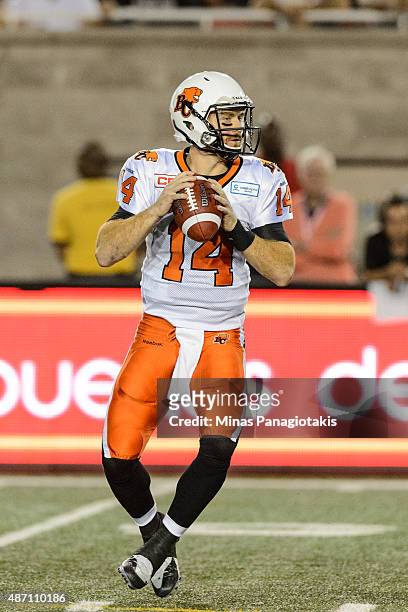 Travis Lulay of the BC Lions looks to pass the ball during the CFL game against the Montreal Alouettes at Percival Molson Stadium on September 3,...