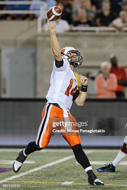 Travis Lulay of the BC Lions throws the ball during the CFL game against the Montreal Alouettes at Percival Molson Stadium on September 3, 2015 in...