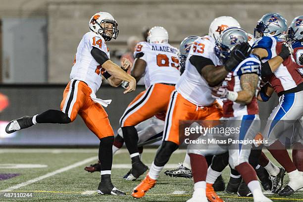 Travis Lulay of the BC Lions watches his throw during the CFL game against the Montreal Alouettes at Percival Molson Stadium on September 3, 2015 in...