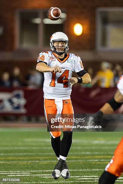 Travis Lulay of the BC Lions throws the ball during the CFL game against the Montreal Alouettes at Percival Molson Stadium on September 3, 2015 in...