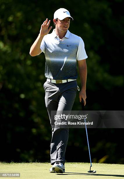 Rory McIlroy of Northern Ireland waves to the crowd on the 18th green during round three of the Deutsche Bank Championship at TPC Boston on September...