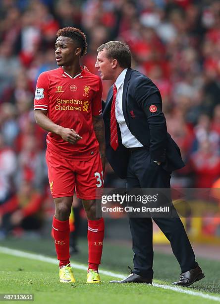 Liverpool manager Brendan Rodgers gives instructions to Raheem Sterling during the Barclays Premier League match between Liverpool and Chelsea at...