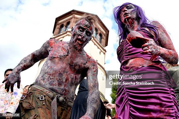 Participants take part at the Zombie Walk Duesseldorf along the Rheinuferpromenade on September 6, 2015 in Duesseldorf, Germany. A zombie walk is an...