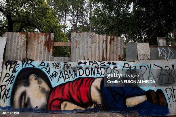 Graffiti depicting Aylan Kurdi, also known as Aylan Shenu, a Syrian three-year-old boy whose drowning off a Turkish beach, is seen in Sorocaba, some...