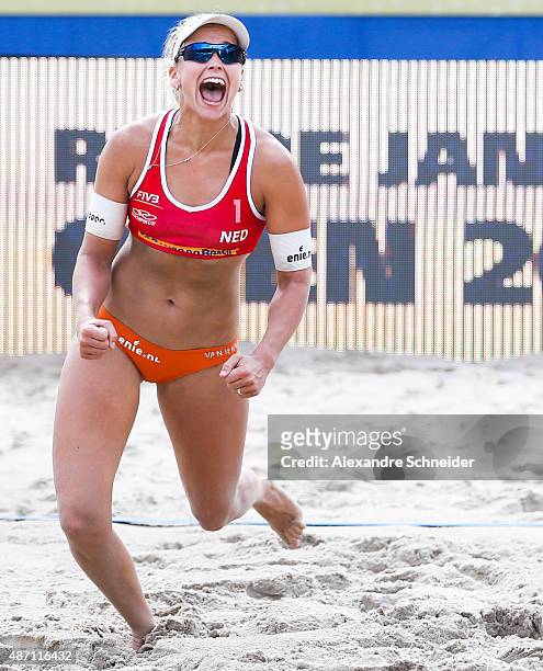 Madelein Meppelink of Netherlands celebrates their victory after winning the bronze medal match against Brazil at Copacabana beach during day five of...