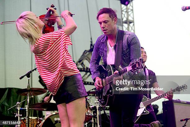 Anna Bulbrook and Mikel Jollett of The Airborne Toxic Event perform during Riot Fest at the National Western Complex on August 28, 2015 in Denver,...
