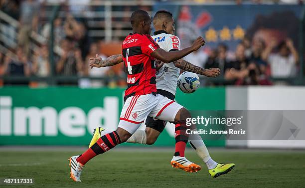 Paolo Guerrero of Corinthians and Samir Caetano of Flamengo during the Brasileirao Series A 2014 match between Corinthians and Flamengo at Pacaembu...