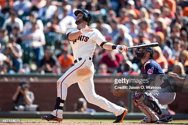 Brandon Hicks of the San Francisco Giants hits a walk-off three-run home run against the Cleveland Indians during the ninth inning at AT&T Park on...