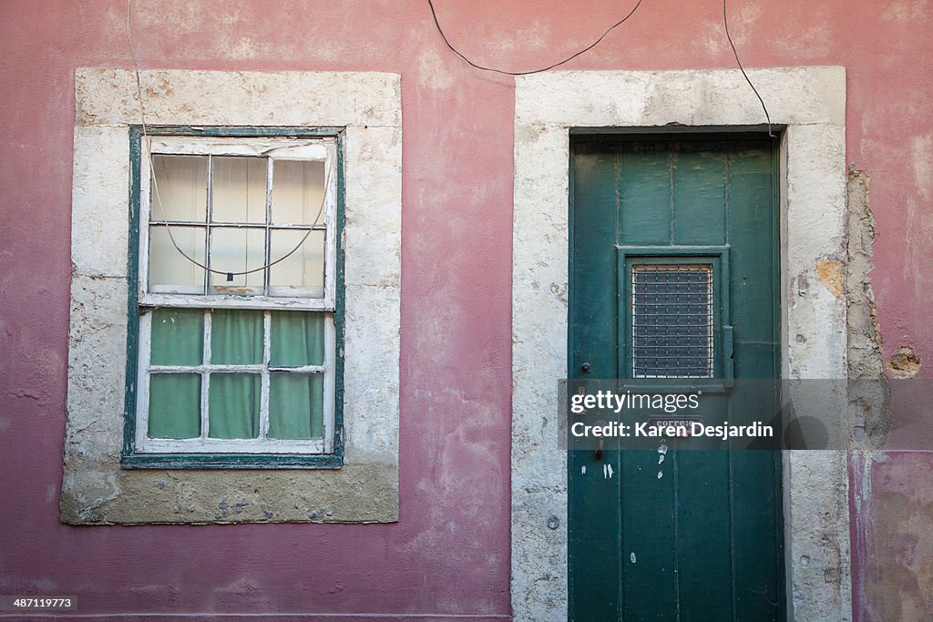 Door and weathered building facade, Alfama