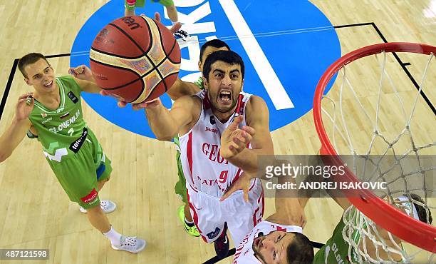 Georgia's center Giorgi Shermadini goes for the basket during the Group C qualifying basketball match between Slovenia and Georgia at the EuroBasket...